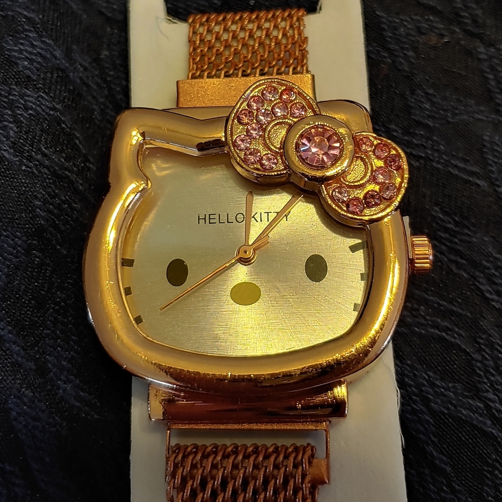 Hello Kitty Gold and Pink Crystal Bow Mesh Strap Watch (Firm Priced)